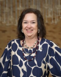 <strong>Kim Kovar</strong><br>
Parent Socials Ring of Honor