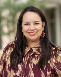 <strong>Alma Tovias '89</strong><br>
President